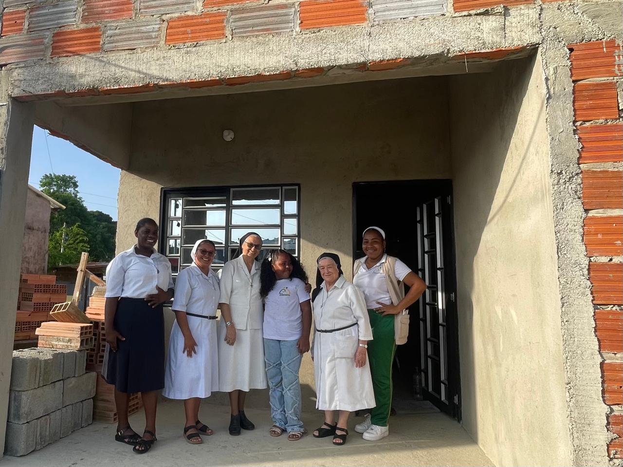 Keyla Mena, su hija y la comunidad (1)